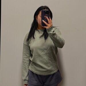Mint/sage green long sleeve top.